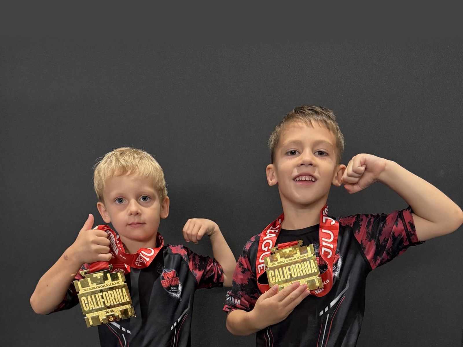 Youth wrestler with a gold medal